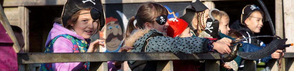 Children dressed as pirates on a school trip